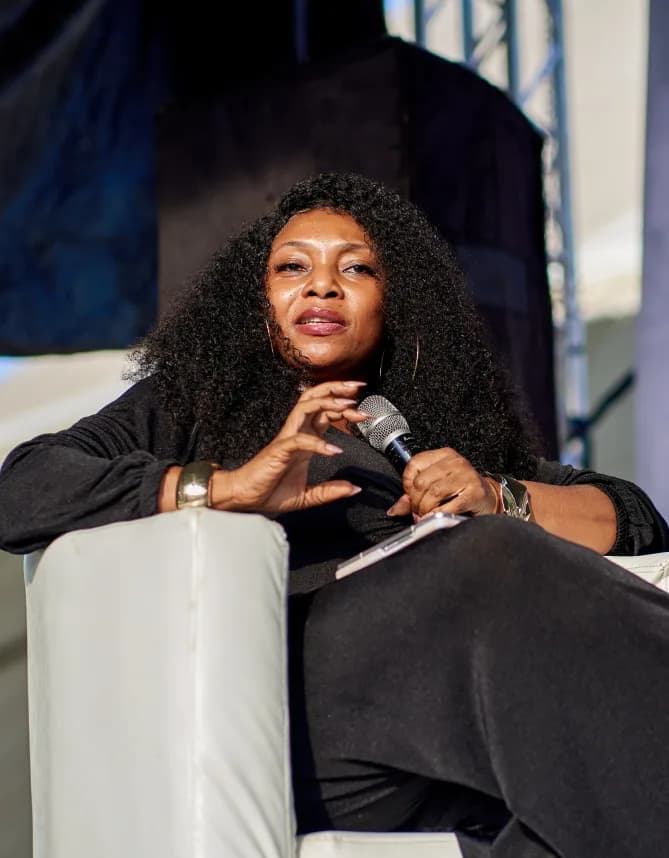 A speaker in conversation on the MADEFest 2025 panel